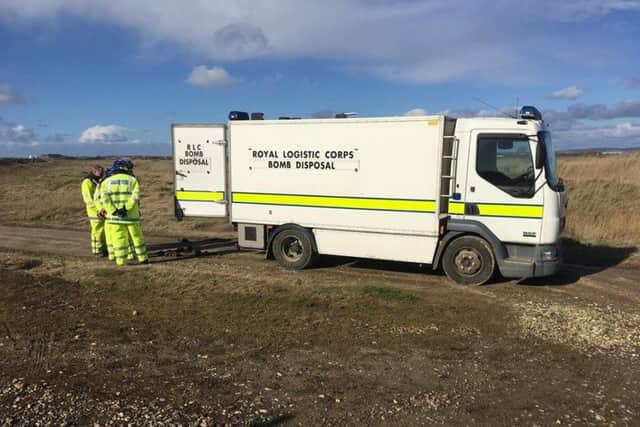 Bomb disposal members at the beach. Selsey Coastguard picture